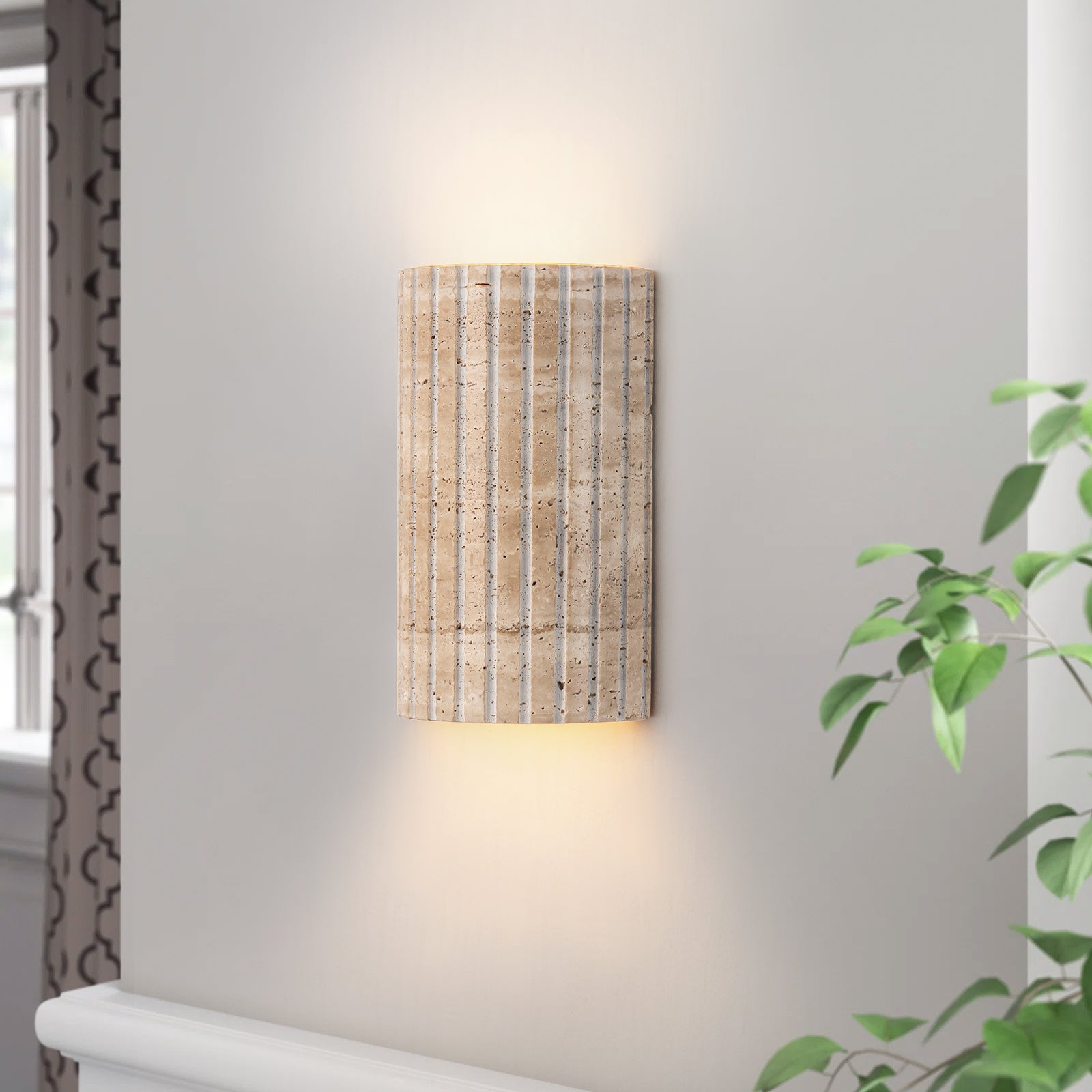 Travertine wall sconce with warm uplight and downlight