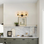 21.73 in. 3-Light Matte Black and Gold Metal Vanity Light with Clear Glass Shades for Bathroom