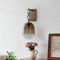 7.09 in. 1-Light Antique Metal Wall Sconce with Oval Gradient Color Glass Shade for Bedroom, Bathroom, Hallway