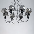 8-Light Black Metal Rings Chandelier Industrial Smoky Glass Globe - product image 8 | Zenvolit