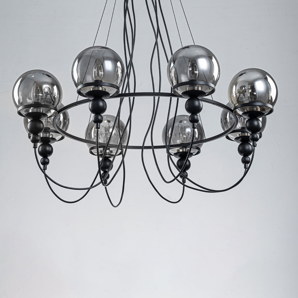 8-Light Black Metal Rings Chandelier Industrial Smoky Glass Globe - product image 8 | Zenvolit